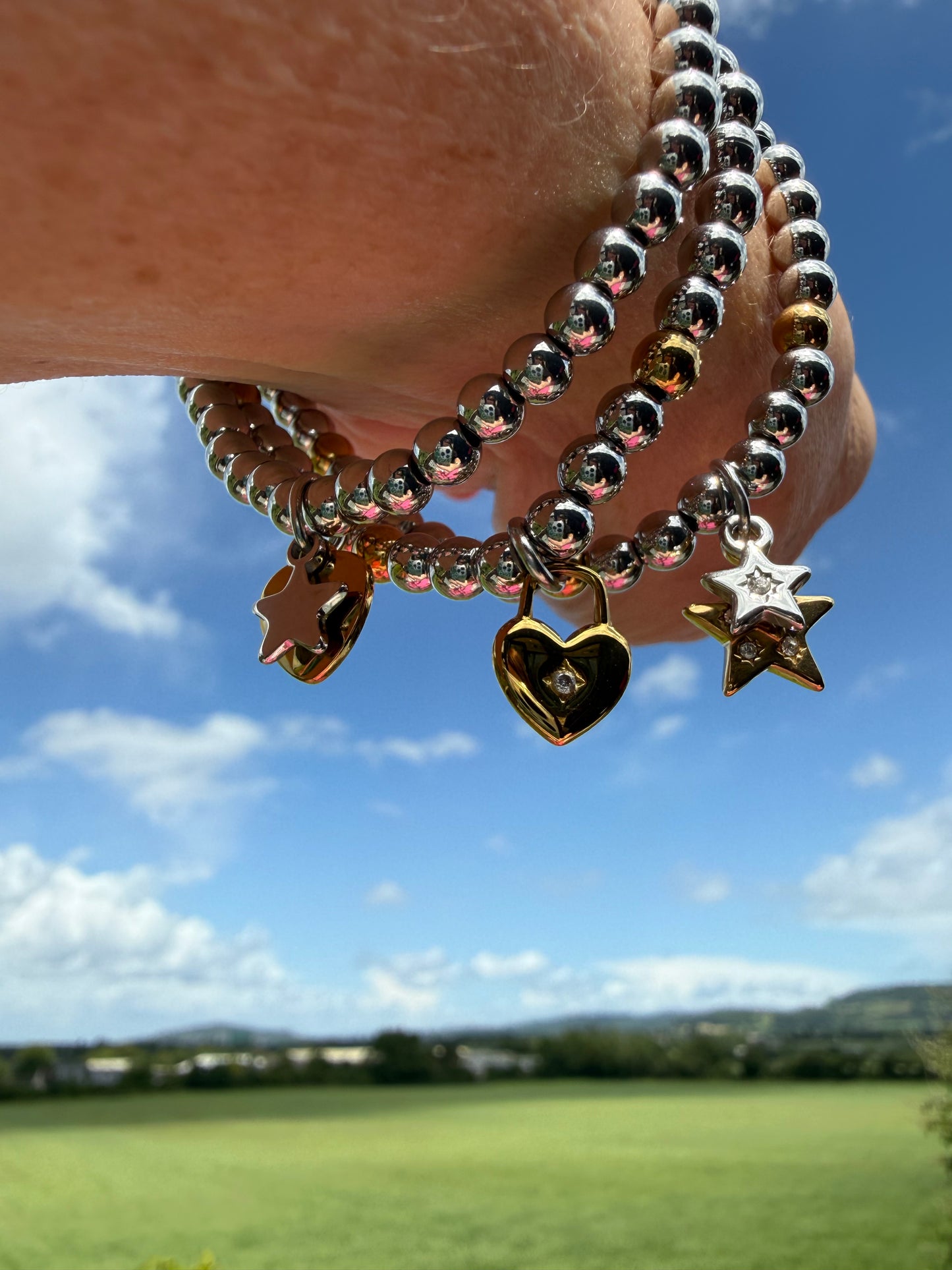 Elasticated Mix-Metal Bracelet with Star Charms - NOSTRUM